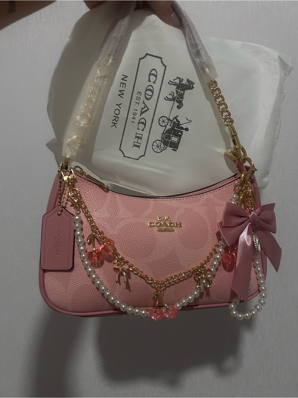 Coach Pink Leather Shoulder Bag with Gold Hardware & Pearl Charm Details